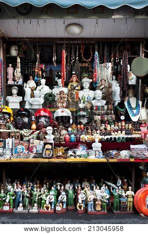 SHANGHAI, CHINA - DEC 30, 2012 - An antique-packed stall at Shanghai's Dongtai Road antique market
