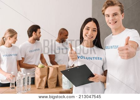 Volunteers Showing Thumb Up
