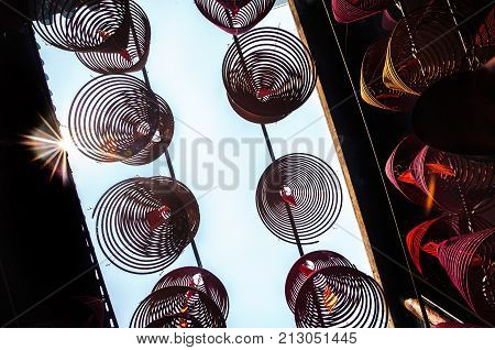 Incense coils hang from the ceiling of Tin Hau Temple Yaumatei Hong Kong