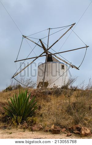 Windmill In Budens, Southwestern Coast Of Portugal