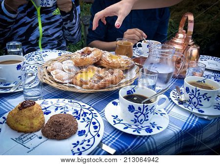 Fika time in a perfect Swedish afternoon. When the sun starts to set, and the fiends are coming over, is time for a cup of coffee with sweets.
