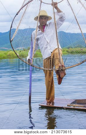 INLE LAKE MYANMAR - SEP 07 : Burmese fisherman at Inle lake Myanmar on September 07 2017 inle Lake is a freshwater lake located in Shan state