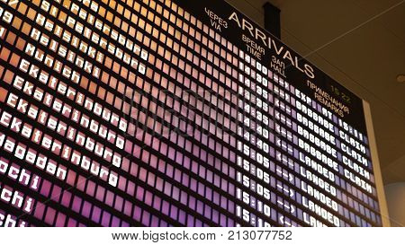 Departures Board At The Airport. Flight Information Electronically Timetable. Split Flap Mechanical 