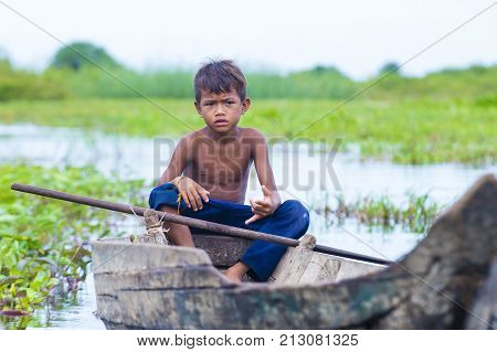 TONLE SAP CAMBODIA - OCT 18 : Cambodian child in Tonle sap lake Cambodia on October 18 2017. Tonle sap It is the largest lake in South East Asia