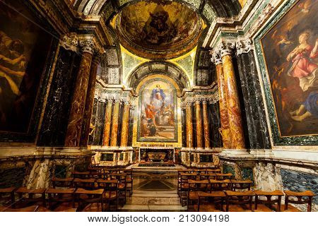 ROME, ITALY. February 24. 2015: Maria immaculate conception with saints. Carlo Maratta, painter of the seventeenth century. In the chapel Cybo, church of Santa Maria del Popolo in Rome, Italy.