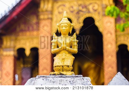 Statue Of A Buddhist Godt, Louangphabang, Laos. Close-up.