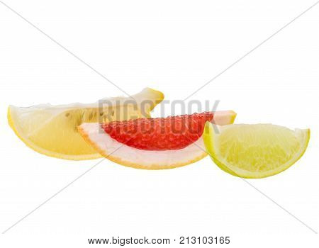 Appetizing bright, tasty, ripe slices of grapefruit lemon and lime isolated on white background