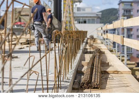 Construction of an apartment house. Concrete slab foundation building. The foundation of reinforced concrete apartment building.