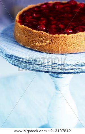 Cheesecake Decorated With Cherry Sauce With Berries