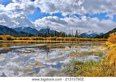 Vermilion Lake in fall colours. Mount Norquay reflections in water. Banff National Park. Alberta. Canadian Rocky Mountains. Canada.
