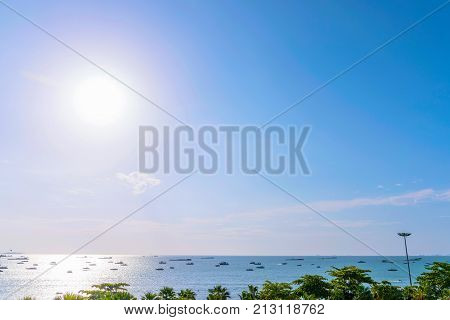 Scenic view of sea with boats in Pattaya Thailand
