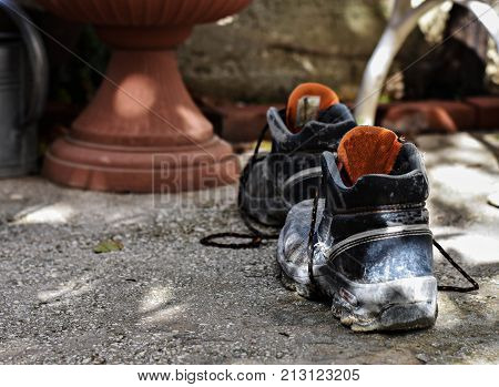 Old working shoes. Shoes overage. Shoes which have walked many kilometers