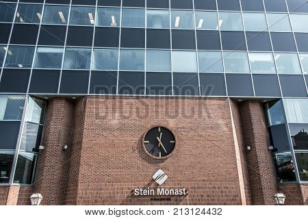 Quebec, Canada 12.09.2017 Vintage Station Clock On A Red Brick Wall at the Stein Monat lawyer building