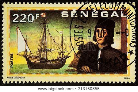 Moscow Russia - November 09 2017: A stamp printed in Senegal shows Christopher Columbus and ship 