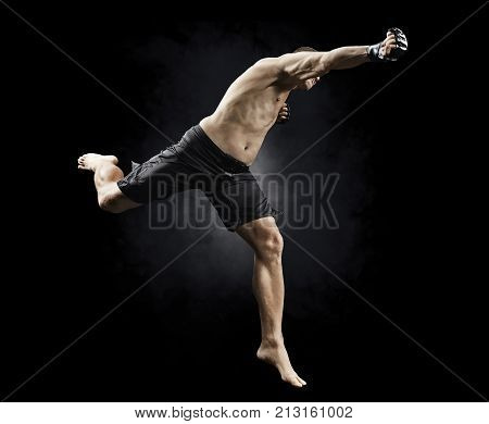 mma fighter flying with a punch isolated