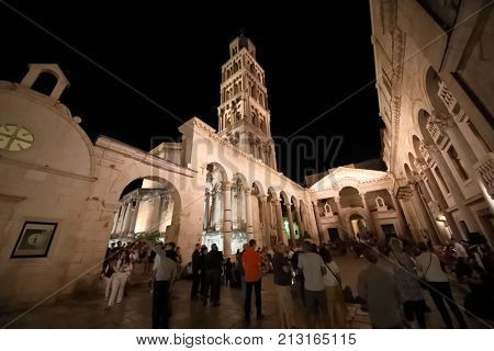 SPLIT, CROATIA - MAY 19, 2017: Tourists in Peristyle Palace of the Emperor Diocletian in the evening