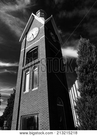 Coldwater, Michigan, United States-July 6, 2017:  A black and white photograph of a clock tower located in the historic town of Coldwater Michigan