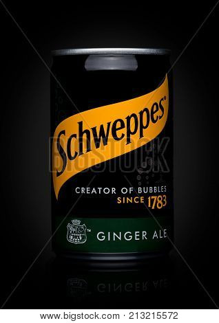 London, Uk - November 10, 2017: Schweppes Tin Ginger Ale Taste On Black.the Dr Pepper Snapple Group