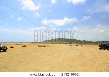 Natural beauty of Aruba. North coast. Off-road UTV Aruba tour. Amazing stone desert landscape and blue sky. September, 2017