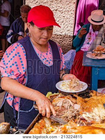 Vendor Prepares Hornado (pig) Lunch For Customer