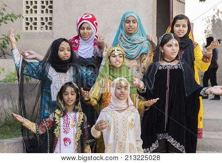 Nizwa Oman November 10th 2017: omani girls dressed in traditional cloting