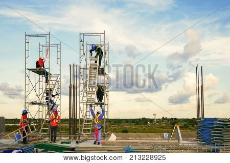 construction worker on scaffolding in industrial construction