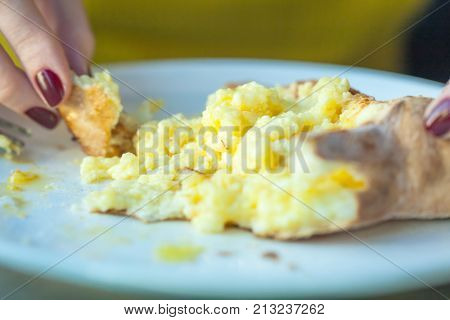 Eating Adjarian Khachapuri With Eggs On The Table