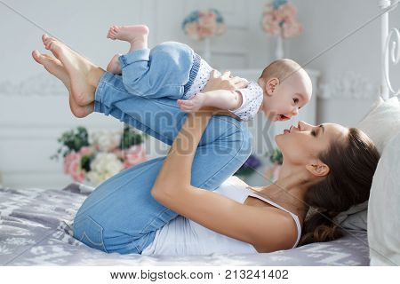 Beautiful Young Woman,brunette With Thick Hair Braided In A Thick Braid, Makeup And Pleasant Smile,d