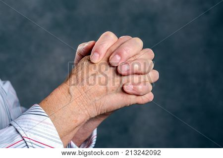Wrinkly Hands Of  Elderly Woman Praying