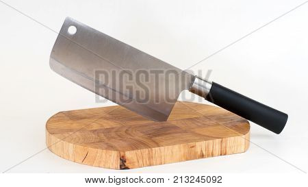 Chinese knife with a cutting board. Front view. White background