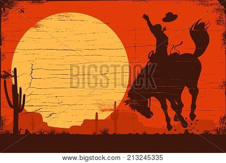 Silhouette of a cowboy riding a wild horse at sunset on a wooden sign, vector