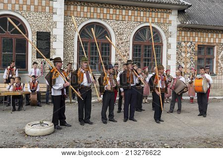 Yasinya Ukraine - September 29 2016: Hutsuls in national costumes with folk instruments meet the guests of the 2nd International Conference 