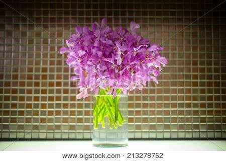 Mokara bouquet in glass pot decoration in room