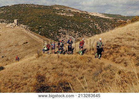 Crimea Russia - October 11 2017: group athletes runners running on mountain trail during Crimea Х Run