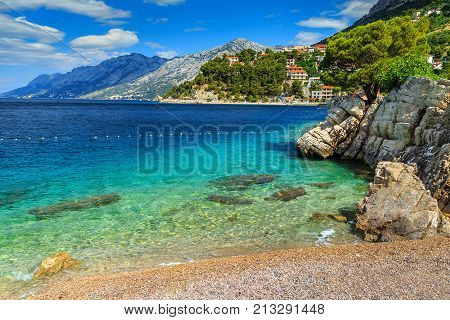 Stunning summer landscape with Adriatic Sea, Biokovo mountains and wonderful bay, Brela beach, Dalmatia, Croatia, Europe