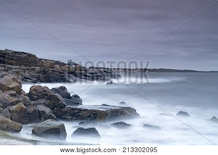 Rocky beach landscape at dusk. Kullaberg Sweden.