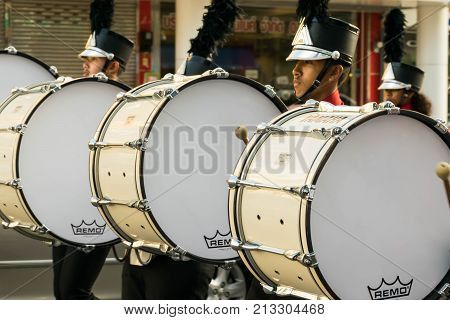 Hatyai Songkhla Thailand - September 12 2017 : Drummers Playing Bass Drum in the Mother's Day Parade