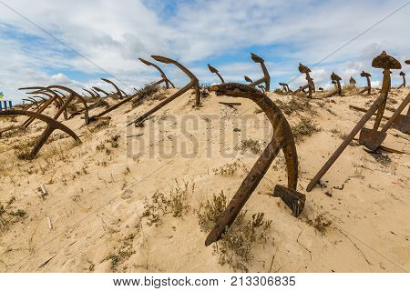 Natural Cemetery Of Marine Anchors At Barril Beach, Portugal