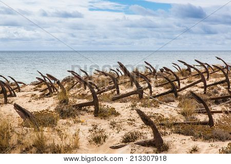 Natural Cemetery Of Marine Anchors At Barril Beach, Portugal