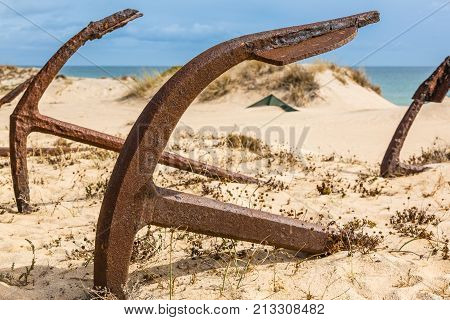 Natural Cemetery Of Marine Anchors At Barril Beach, Portugal