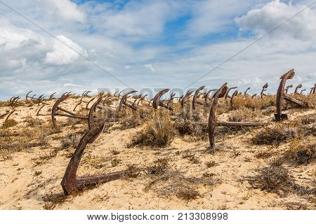 Natural Cemetery Of Marine Anchors At Barril Beach, Portugal