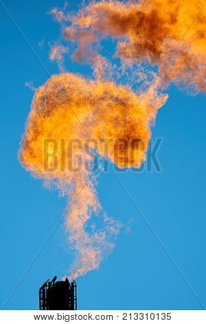 Combustion of associated petroleum gas.
Associated gas, is a form of natural gas which is found with deposits of petroleum.