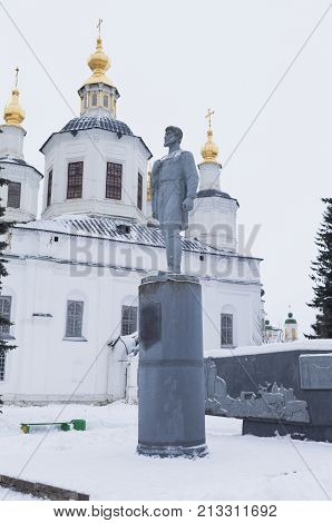 Semyon Dezhnev Monument on background the cathedral in Veliky Ustyug, Vologda region, Russia