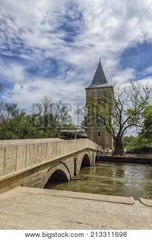 Court Tower of Justice and Sultan Suleyman bridge in Edirne city of Turkey.Freedom tower to kirkpinar using old stone bridge.