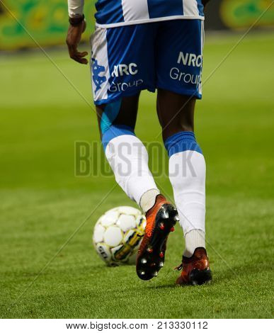SOLNA SWEDEN - OCT 30 2017: Soccer player dribble the ball. October 30 2017SolnaSweden