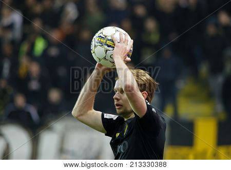SOLNA SWEDEN - OCT 30 2017: Soccer player making a throw-in. Robert Taylor (AIK) have the ball under control. October 30 2017SolnaSweden