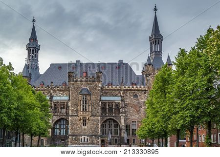 The Gothic Aachen Rathaus or Aachen City Hall lies next to the Aachen Cathedral and is one of the most striking structures in the Altstadt of Aachen Germany.