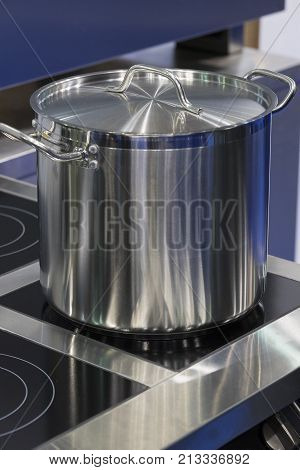 Metal stainless steel pan on a kitchen stove