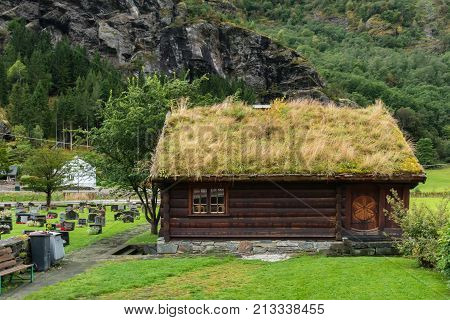Flam is a village in Flamsdalen at the inner end of the Aurlandsfjorden a branch of Sognefjorden. The village is located in the municipality of Aurland in Sogn og Fjordane county Norway.