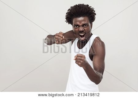 Dangerous Fighter. Afro Man Ready To Fight. Studio Shot.
